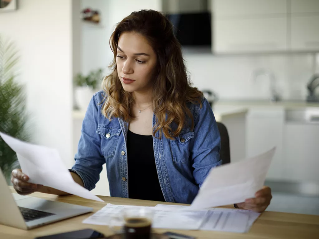 woman using debt validation letter