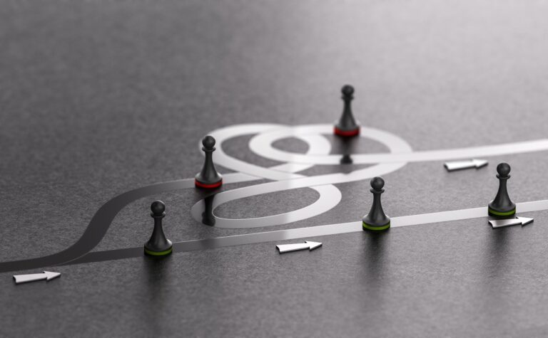 image of chess pawns trying to move forward