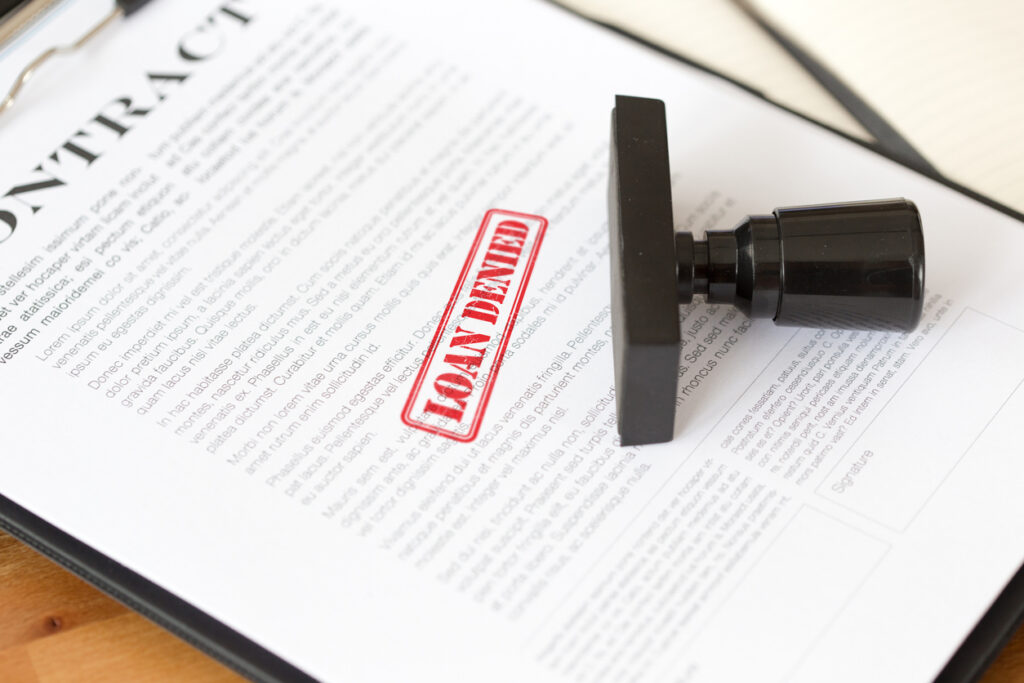 Home equity loan application with a stamp of "denied"