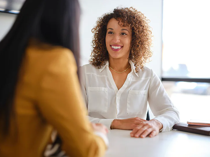 Young woman choosing to get cash for her structured settlement