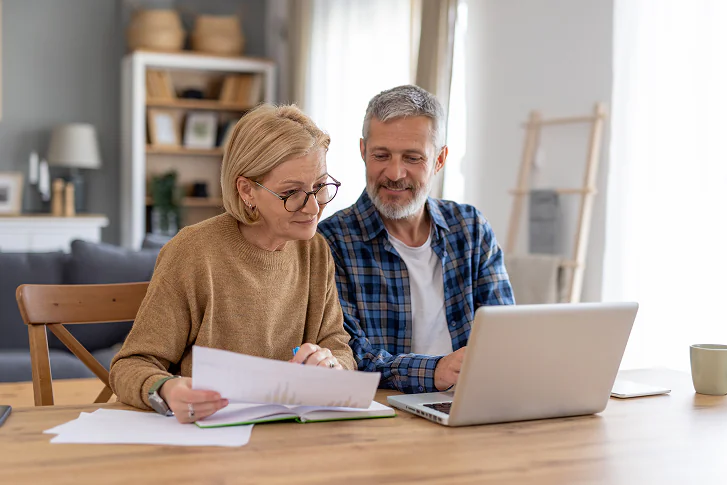 Couple learning their options to get out of debt
