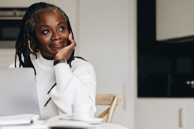 Woman pondering selling portion of life insurance policy