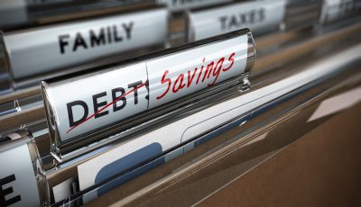 File folder tab with debt replaced by savings