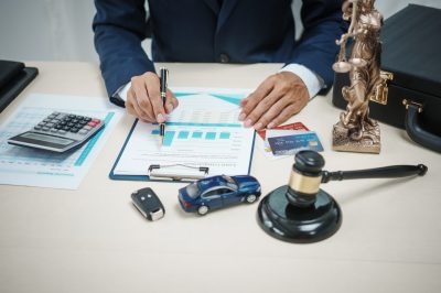 Lawyer looking at debt consolidation offers for client