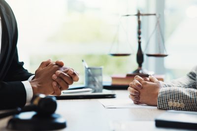 Meeting with law firm for debt settlement negotiation