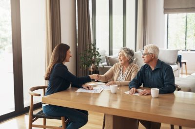 Older couple meeting with financial advisor