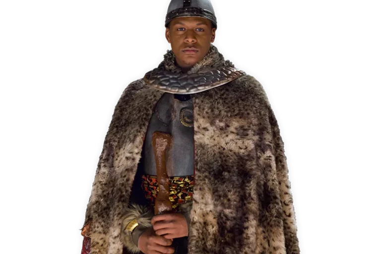 Viking noble Frode wearing a fur cape and an iron helmet