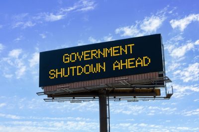 Electronic highway billboard with government shutdown ahead warning Electronic highway billboard with government shutdown ahead warning