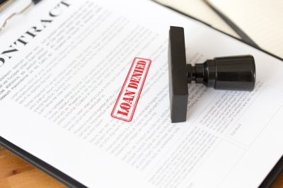 Home equity loan application with a stamp of "denied"