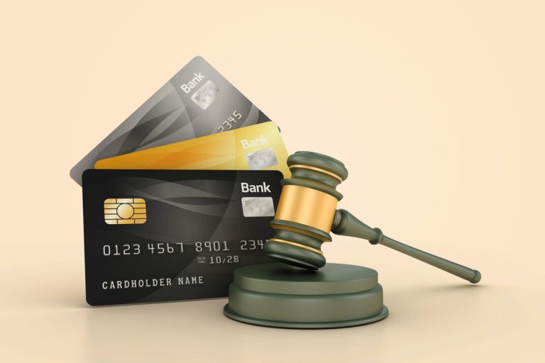 Legal Gavel with Credit Cards - Colored Background - 3D Rendering