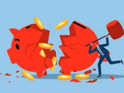 man breaking piggy bank