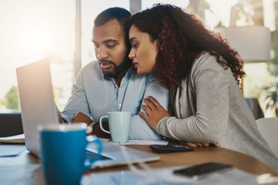 young couple looking at life insurance options
