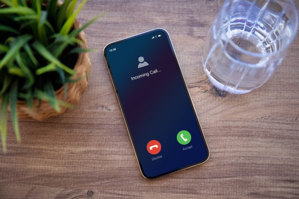 phone with incoming call on screen