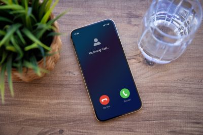 phone with incoming call on screen