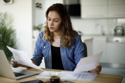woman using debt validation letter