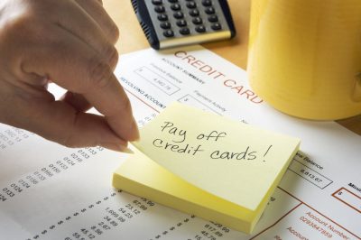 Sticky note to pay off credit card. Stuck in monthly debt cycle,