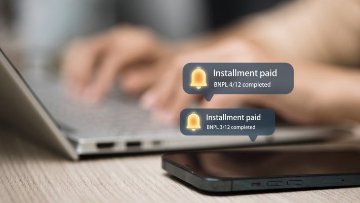 Digital BNPL Payment Notification, Installment Paid Message on Smartphone and Laptop